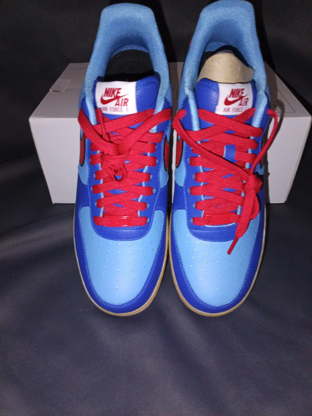 Nike Low-Top Sneakers in Light Blue, Royal Blue & Red with Gum Sole